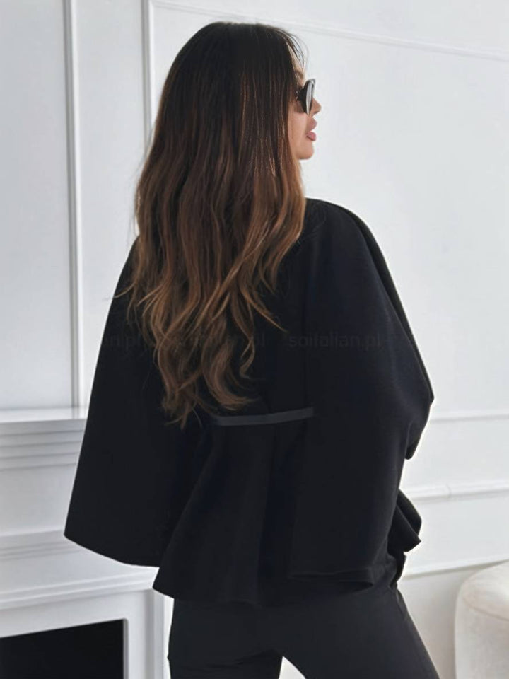 Damen Gürteljacke im Poncho-Design, ideal für Layering & entspannte Herbstlooks.