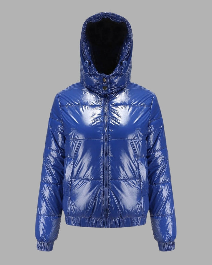 Atmungsaktive Damen Pufferjacke mit Glanz-Optik, ideale Frühlings- & Freizeitjacke in schmalem Schnitt.