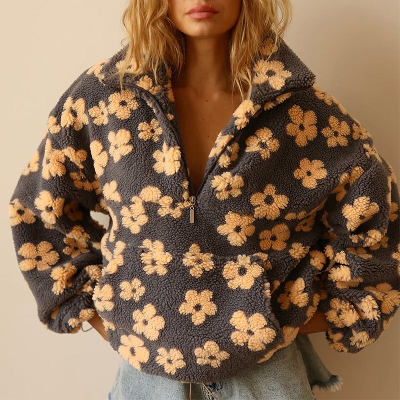 Damen Pullover mit Blumenmuster für gemütliche Herbsttage.