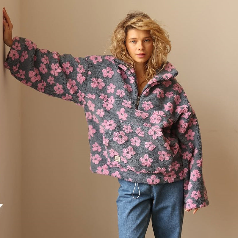 Lockerer Damen Langarm Pullover mit elegantem Blumenmuster, ideal für Herbst Freizeit.