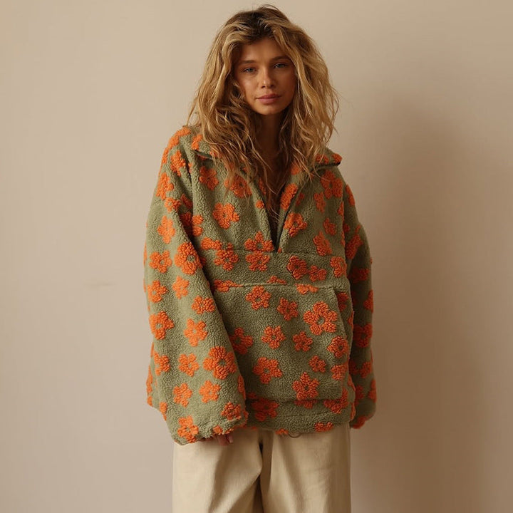 Gemütlicher Damen Pullover mit floralem Muster, perfekt für kühle Herbsttage.
