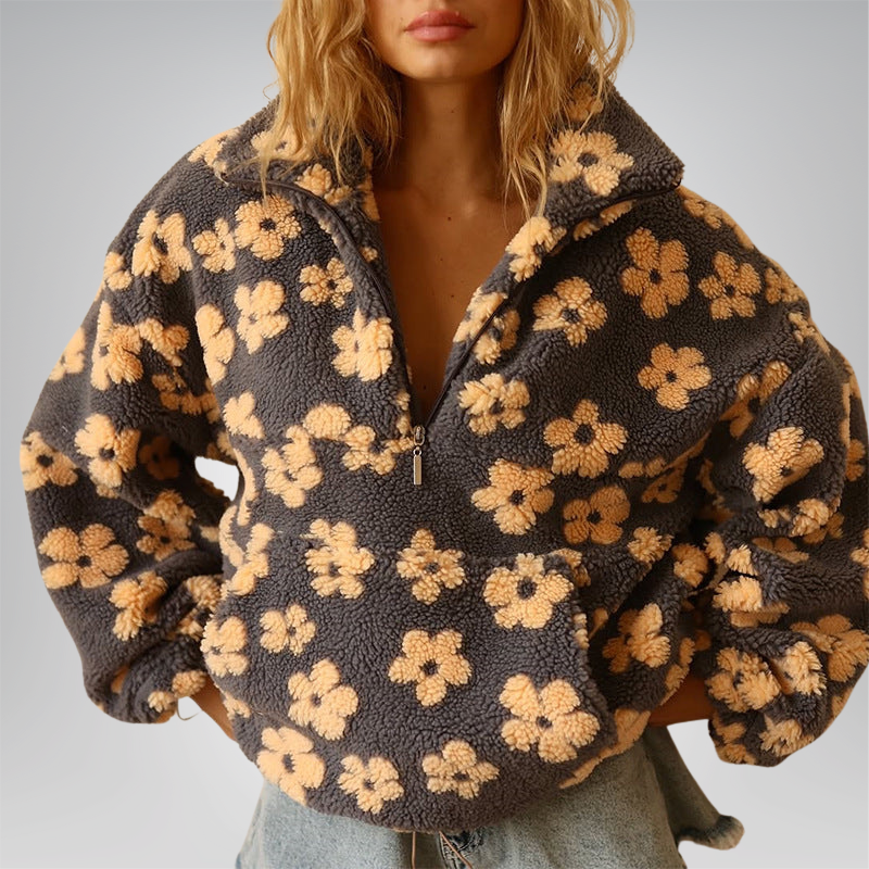 Stylischer Damen Pullover mit farbenfrohem Blumenmuster. Perfektes Herbst-Oberteil.