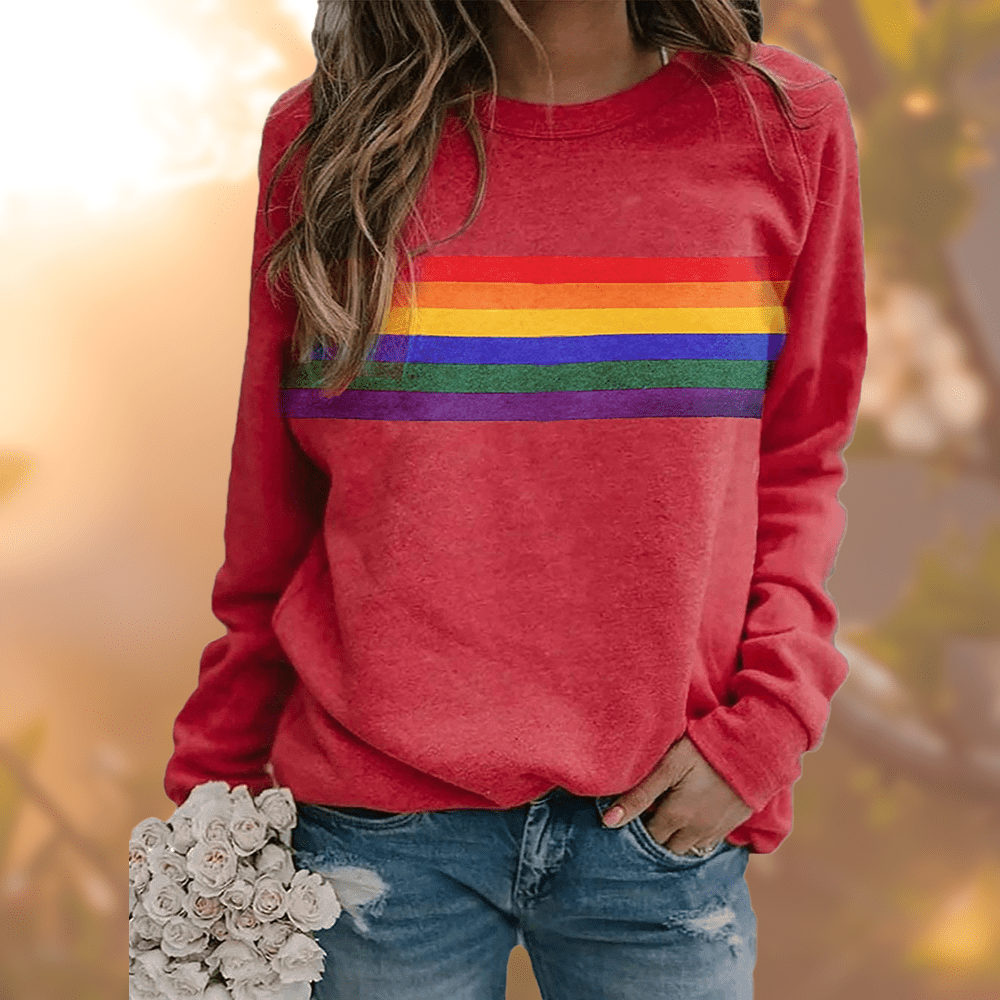 Stylischer Damen Winter-Pullover mit auffälligen Regenbogenstreifen; gemütlich und alltagstauglich.