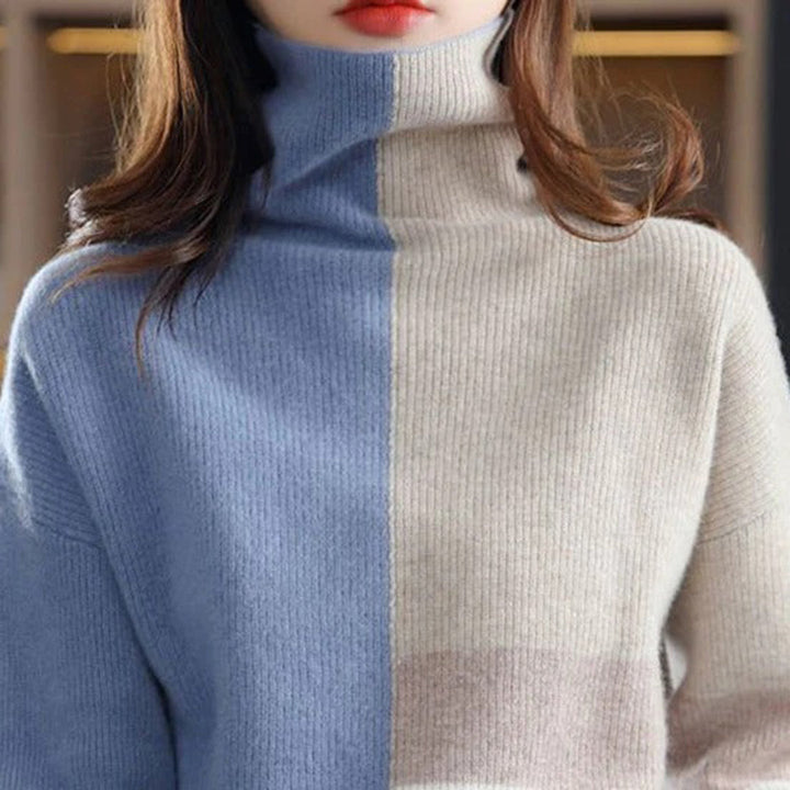 Model trägt bequemen Damen Rollkragen Pullover mit Blockmuster, warmes Langarm Oberteil für den Winter.