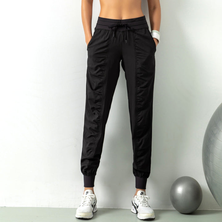 Damen Slim Fit Sporthose, schnelltrocknend und atmungsaktiv, ideal für Fitness & Training.