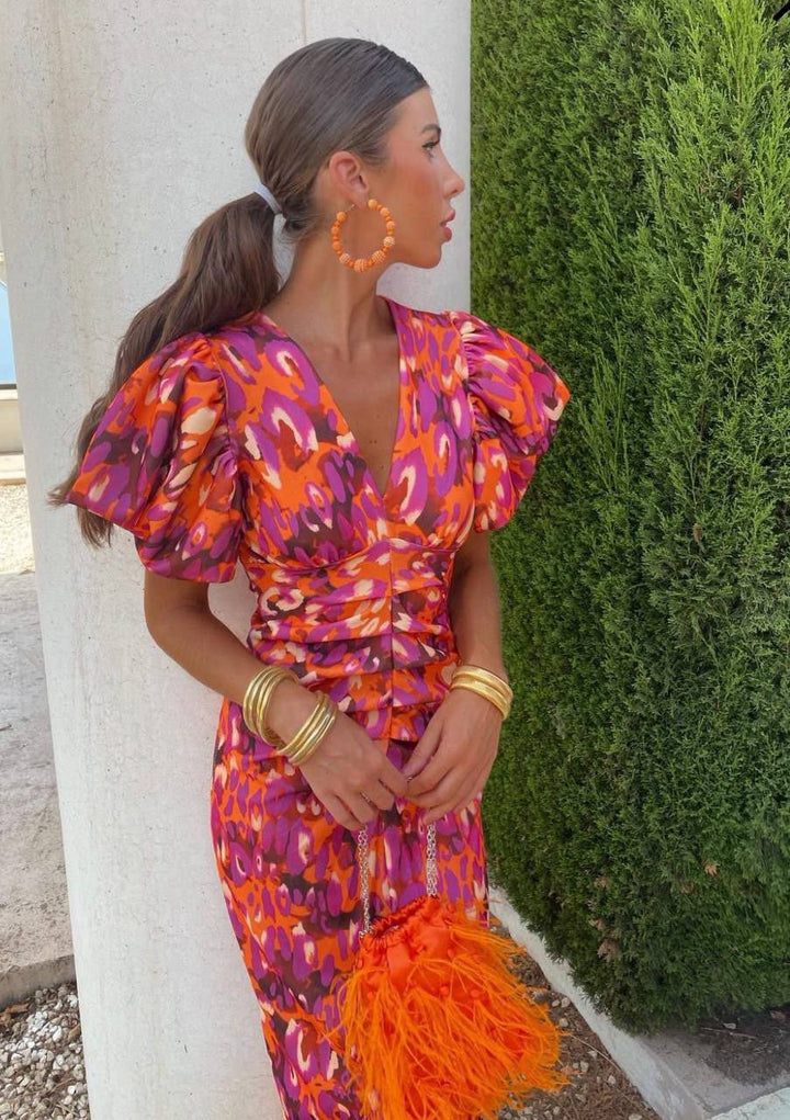 Damen Sommer Midi-Kleid mit bedruckten Puffärmeln in leuchtenden Farben, ideal für Freizeit & Urlaub. Elegant & leicht.