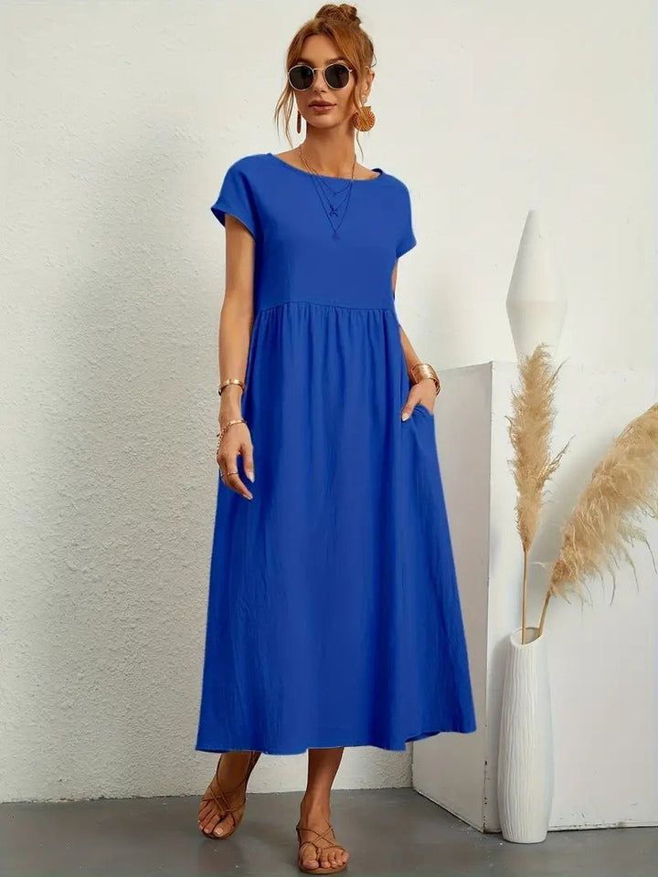Elegantes Damen Sommerkleid Midilänge mit Taschen, vielseitig für verschiedene Anlässe.