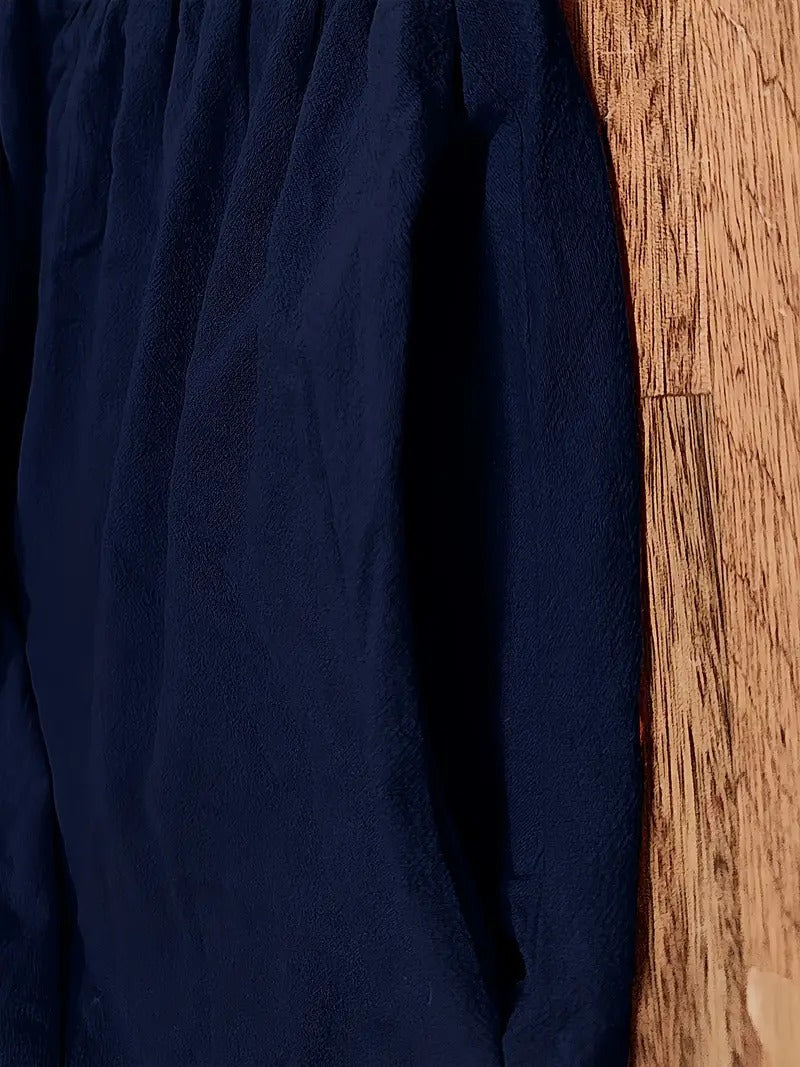 Bequemes Damenkleid Midilänge mit Taschen, ideal für warme Frühlingstage und Abende.
