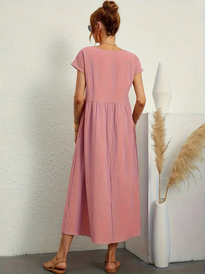 Vielseitiges Damen Sommerkleid mit praktischen Taschen, elegant & entspannt zu tragen.