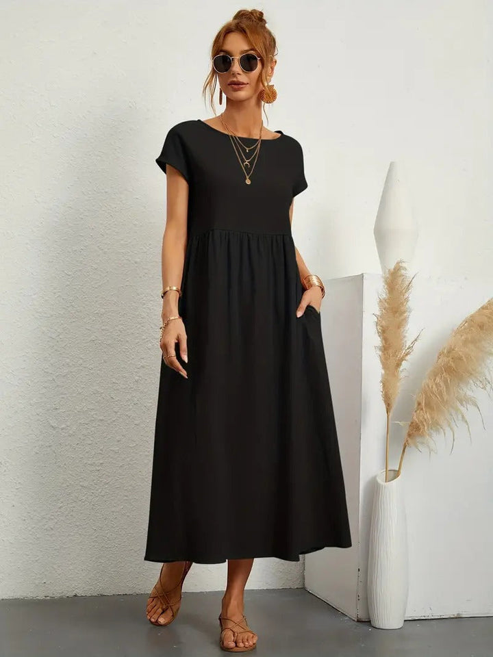 Damen Midikleid mit Kurzarm, seitlichen Taschen, perfekt für Alltag & besondere Anlässe.
