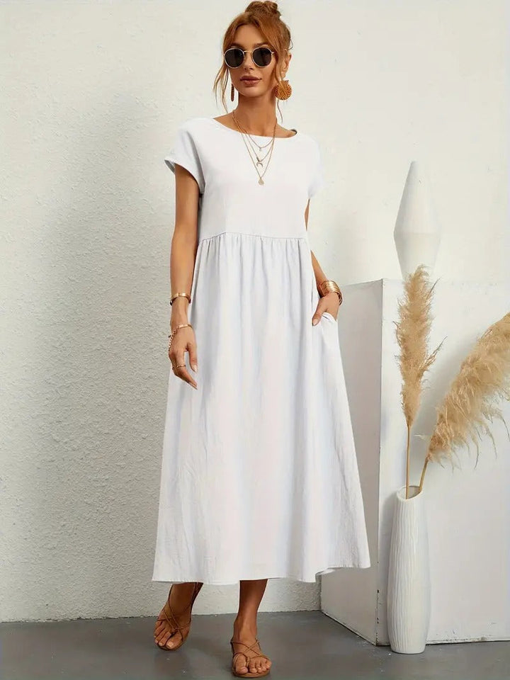 Luftiges Damen Sommer Midikleid mit praktischen Taschen, komfortabel & stilvoll designt.