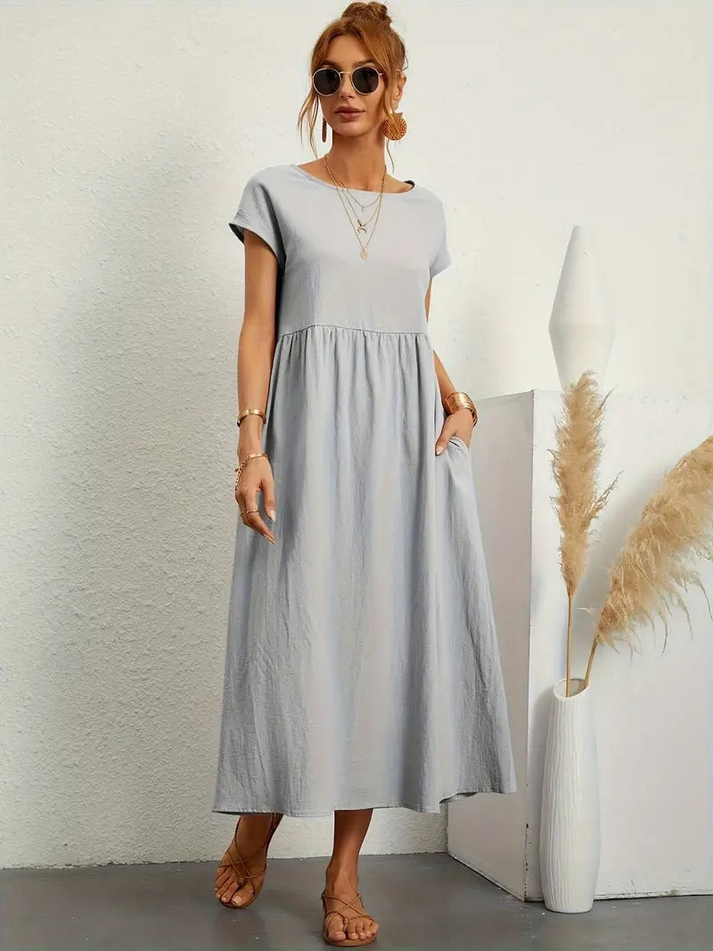 Damen Midikleid mit Taschen, bequem & elegant, ideal für sommerliche Abende.