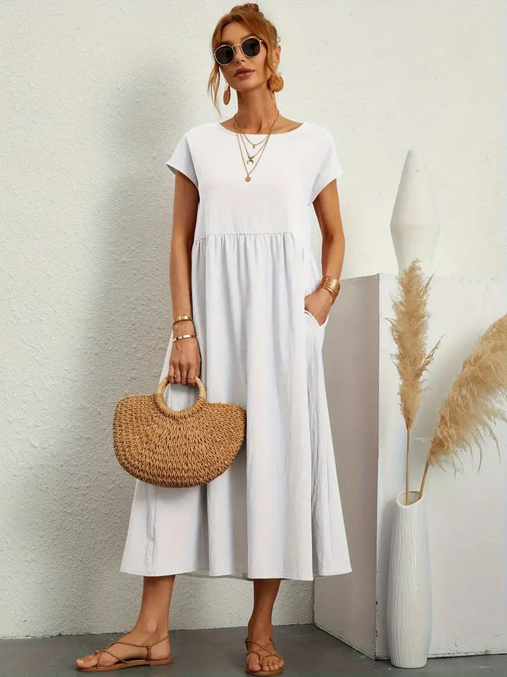 Kurzarm Damen Midikleid mit nützlichen Seitentaschen, chic & komfortabel für den Sommer.