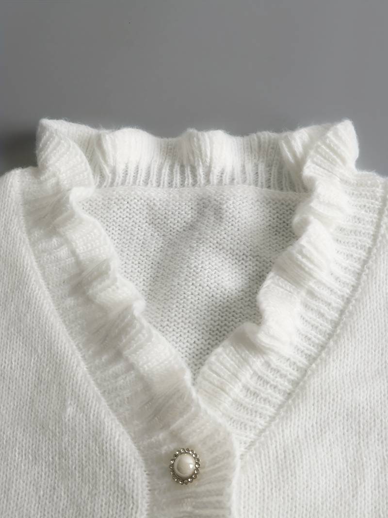 Stylischer Damen Pullover mit V-Ausschnitt und trendigem Knotendetail, optimal für den Herbst-Look.