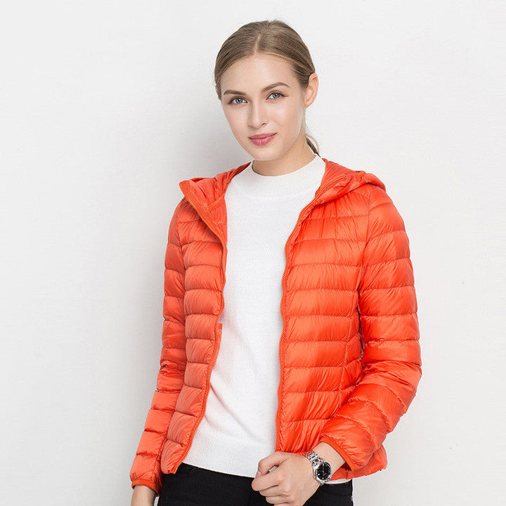 Sportliche Damen Winter Kapuzenjacke, superleicht & warm. Gesteppte Pufferjacke für Komfort an kalten Outdoor-Tagen.