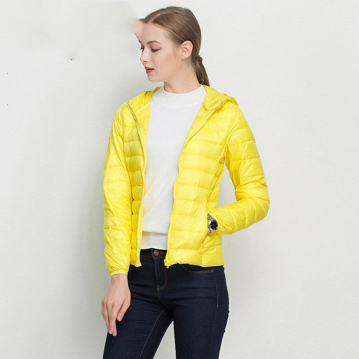 Vielseitige, superleichte Damen Winter Pufferjacke mit Kapuze. Modische Kurzjacke, perfekt für Outdoor, Stadt & Reise.