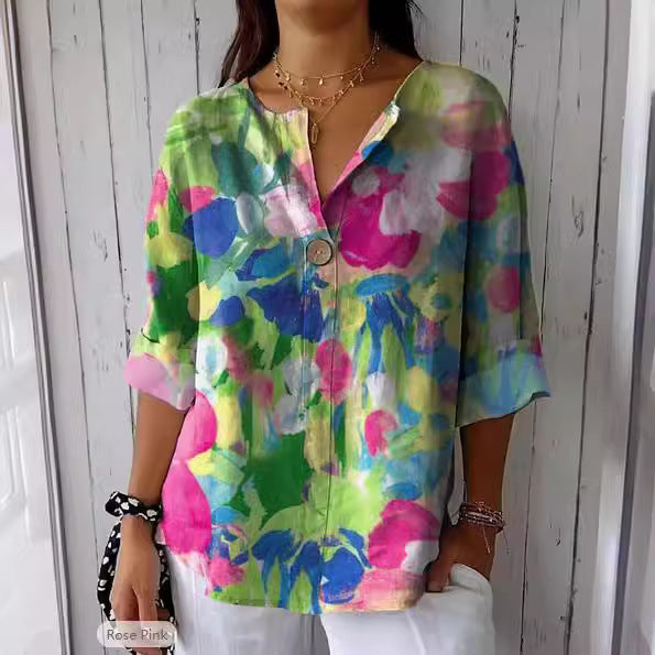 Trendige Damen Tunika-Bluse mit V-Ausschnitt und Farbblock-Muster. Bequeme 3/4 Ärmel, ideal für Herbst.