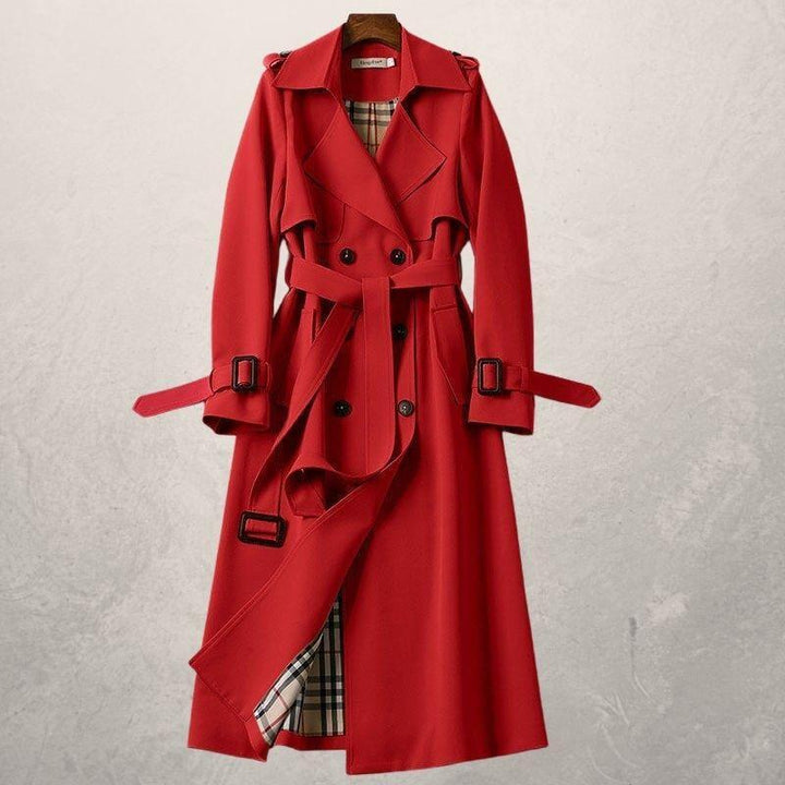 Klassischer Damen Trenchcoat mit Gürtel, Doppelreiher Design. Zeitloser Übergangsmantel für Damenmode.