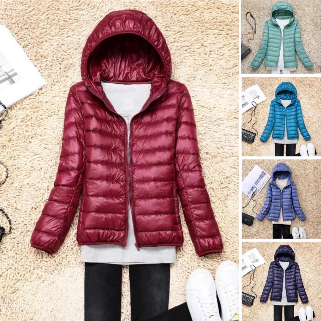 Bequemer Damen Daunenmantel mit Kapuze, leicht und warm für lange Winterspaziergänge.
