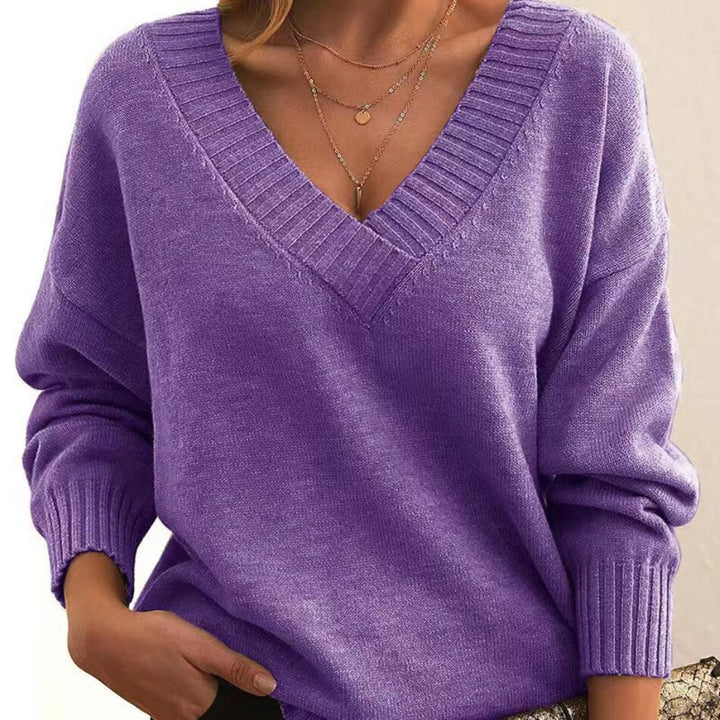 Eleganter Damen Pullover mit V-Ausschnitt, Langarm und lockerem Schnitt für den Winter.
