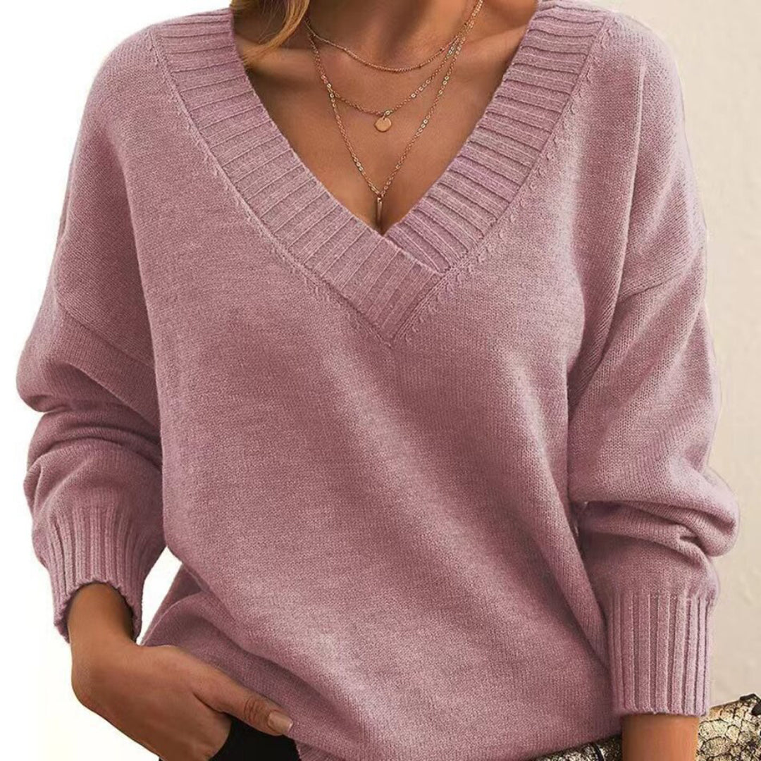 Bequemer Damen Pullover mit V-Ausschnitt und lockerem Schnitt, als elegantes Oberteil geeignet.