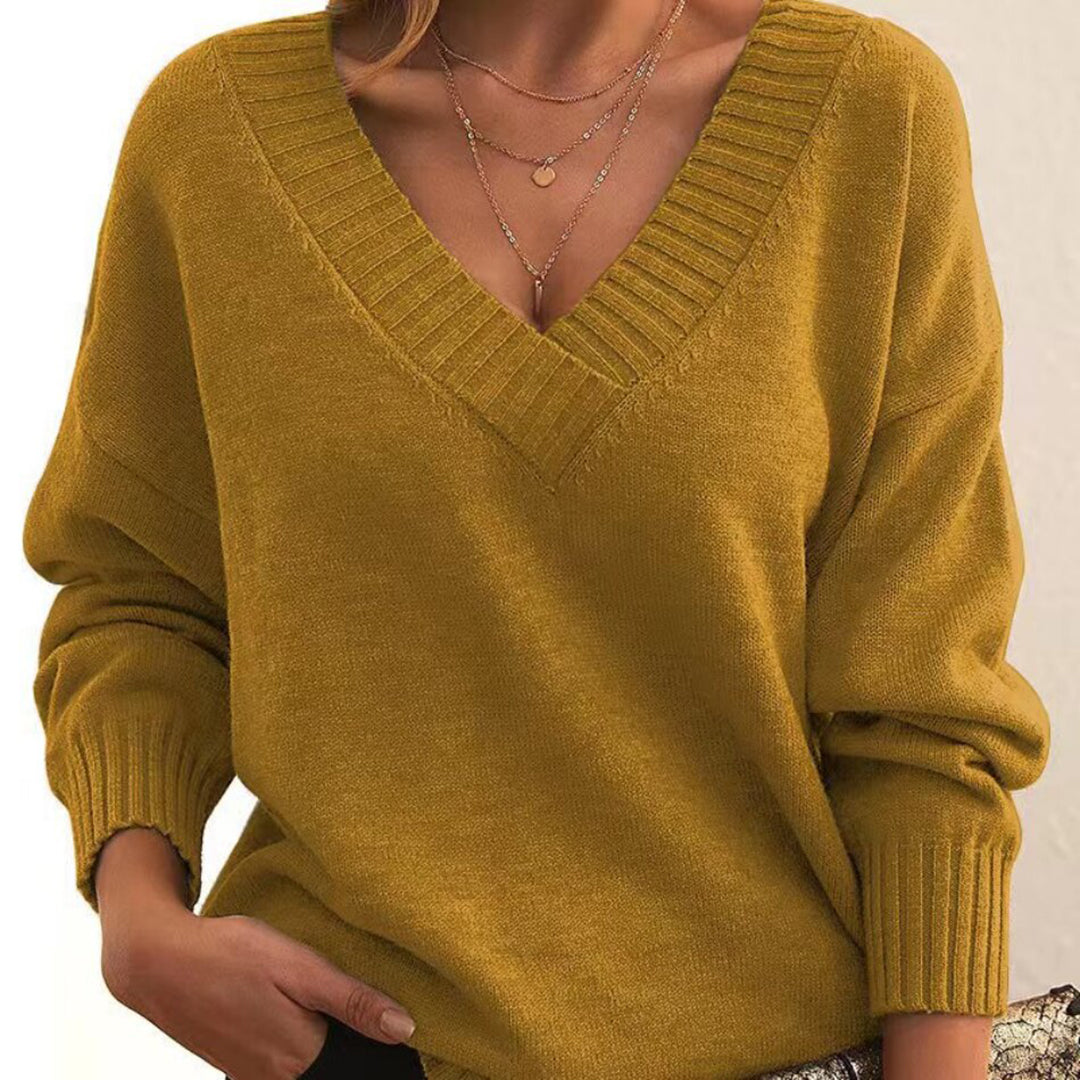 Damen Winter Pullover mit V-Ausschnitt, kuschelig und locker geschnitten für kalte Tage.