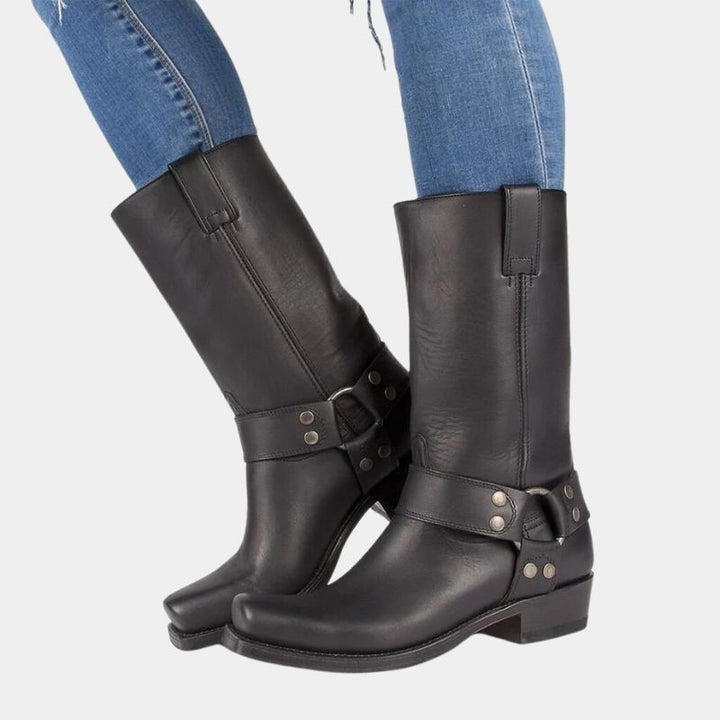Damen Vintage Cowboystiefel aus braunem Leder mit Western-Stickereien und robustem Absatz für zeitlosen Stil.