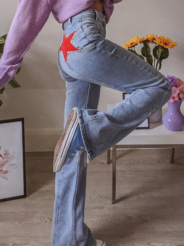 Damen Vintage Schlagjeans mit Stern-Patch & hohem Bund im Retro-Stil.