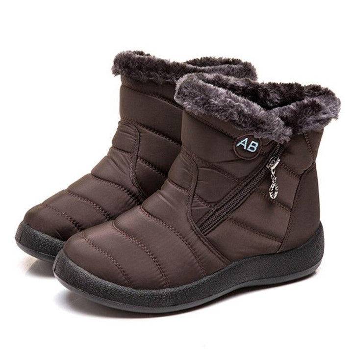 Gefütterte Damen Winterstiefel, wasserdicht und extra warm. Diese bequemen Winterschuhe schützen perfekt vor Kälte.