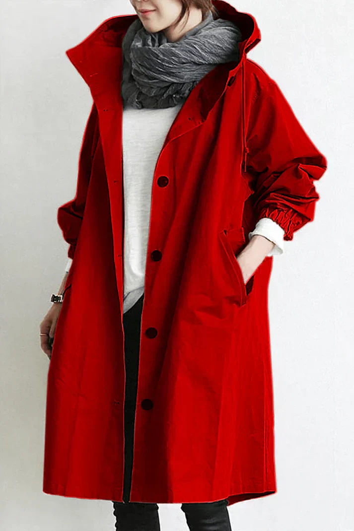 Langer Damen Trenchcoat mit Kapuze, wasserdicht & warm. Die Kapuze bietet extra Schutz bei Regenwetter.
