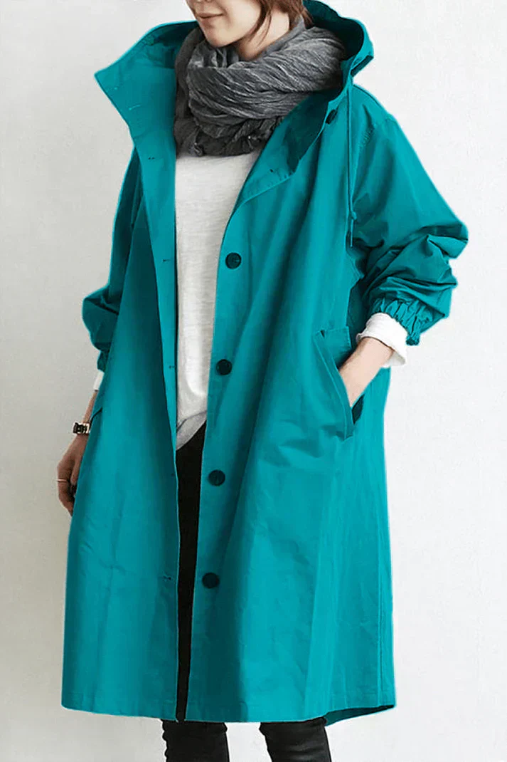 Strapazierfähiger langer Damen Trenchcoat, wasserdichtes Material, warm & robust, mit Kapuze.