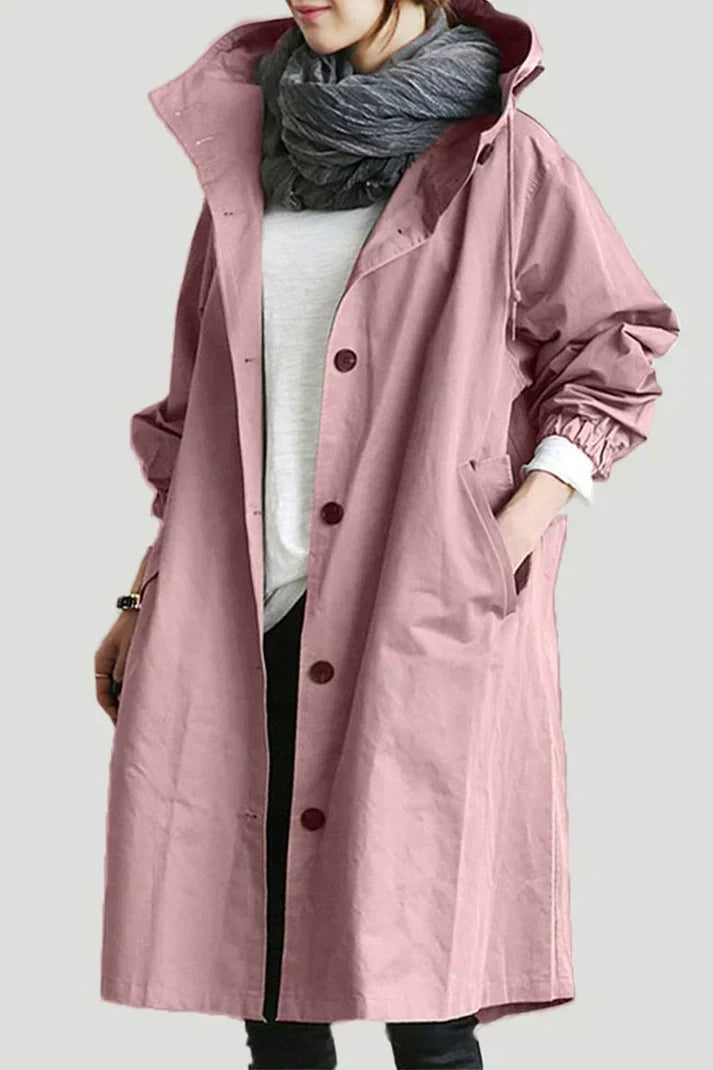 Damen Outdoor Trenchcoat lang mit Kapuze, wasserdicht & warm. Perfekt für Spaziergänge bei jedem Wetter.