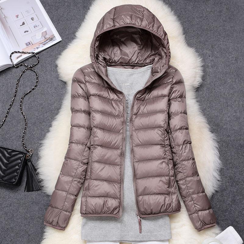 Damen Winter Steppjacke Jasmin mit Kapuze, warm & stilvoll für kalte Tage.