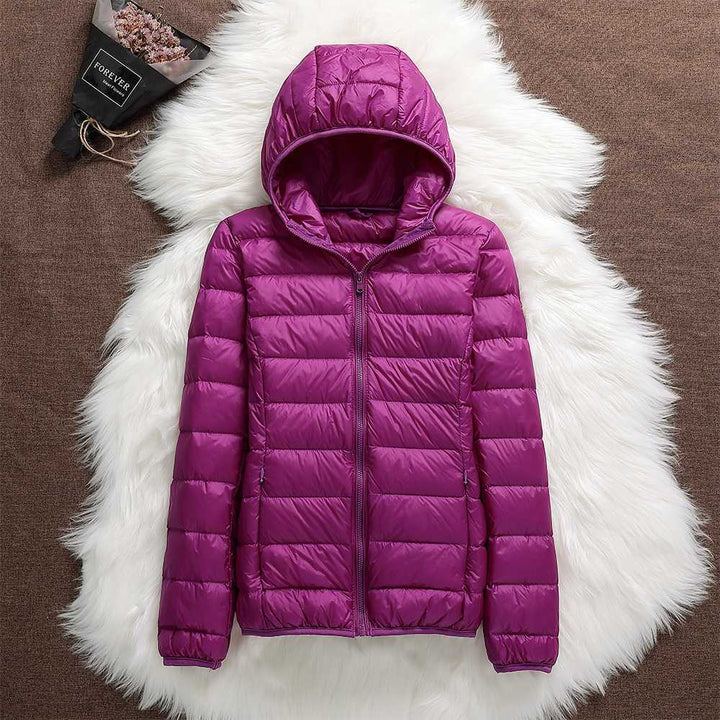 Modische Damen Winter Steppjacke Jasmin mit Kapuze, warm & funktional für Alltag & Outdoor.