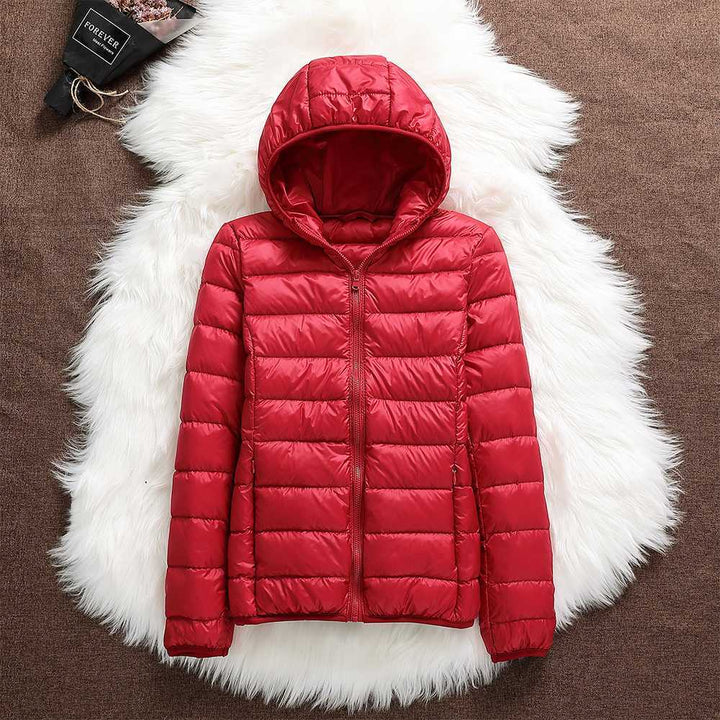 Hochwertige gesteppte Damen Winterjacke Jasmin mit Kapuze, warm & bequem für Outdoor.