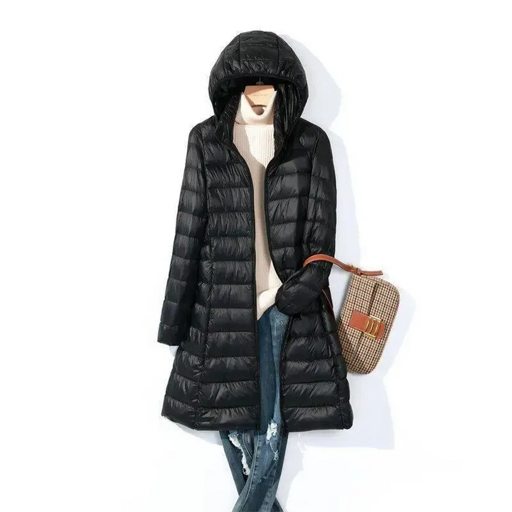 Damen Winter-Steppmantel lang mit Kapuze. Eleganter, warmer Damenmantel, perfekt für kalte Wintertage.