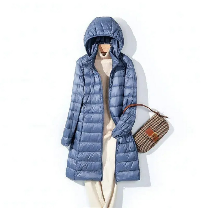 Stilvoller Damen Winter-Steppmantel lang mit Kapuze. Warme Winterkleidung, ideal für Outdoor & elegante Anlässe.