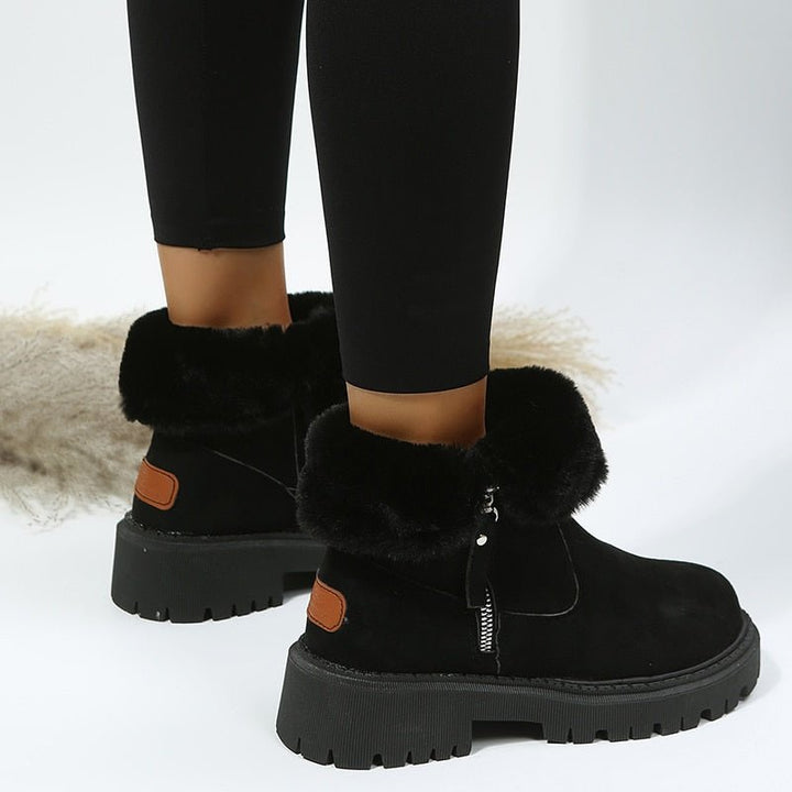 Wasserdichte Damen Winterstiefel mit rutschfester Sohle. Perfekte Outdoor-Schuhe für nasse & eisige Wege.