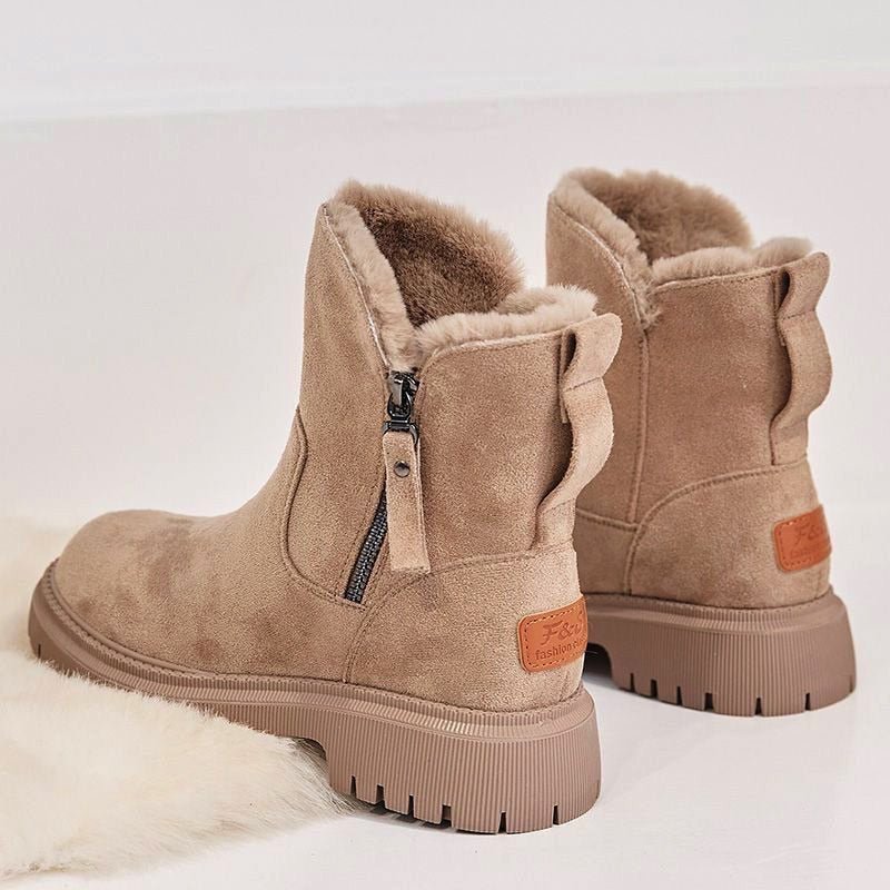 Strapazierfähige Damen Winterstiefel für Outdoor-Abenteuer. Warm, wasserdicht & sicher auf Schnee & Eis.