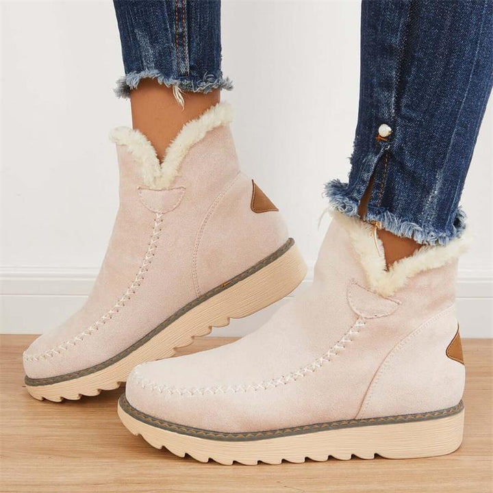 Damen Winterstiefeletten: Slip-On-Design für bequemen Einstieg, ideal für kalte Tage & Alltag.