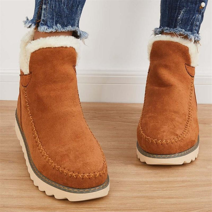 Detail: Rutschfeste Sohle der Damen Winterstiefeletten für sicheren Halt im Schnee & auf Eis.