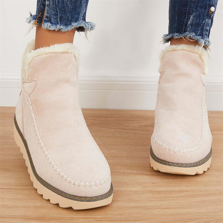 Warme & bequeme Damen Winterstiefeletten im Slip-On-Design, geeignet für Alltag und Outdoor.
