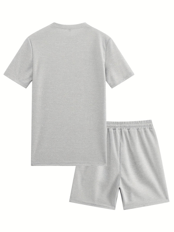 Sportbekleidung für Herren, Rückenansicht des Waffelstrick T-Shirts im Set