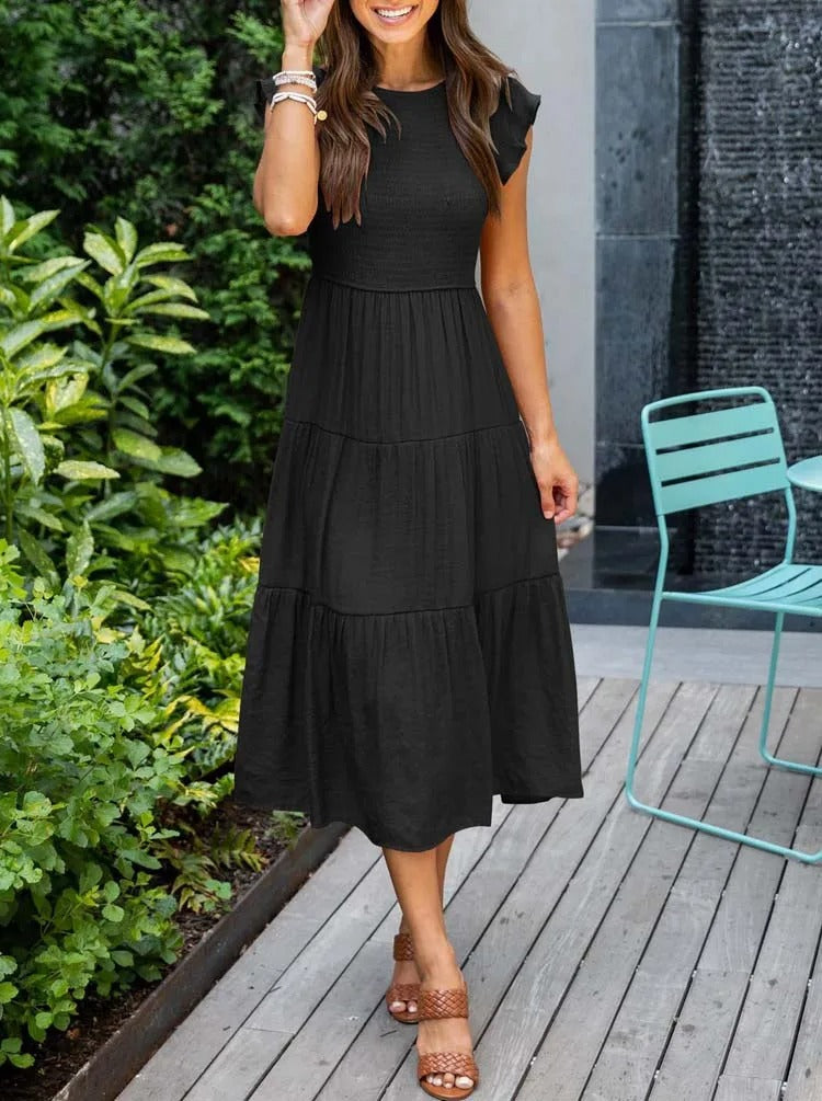Edles dunkelgrünes Damenkleid, figurschmeichelnd und vielseitig kombinierbar, für besondere Momente.