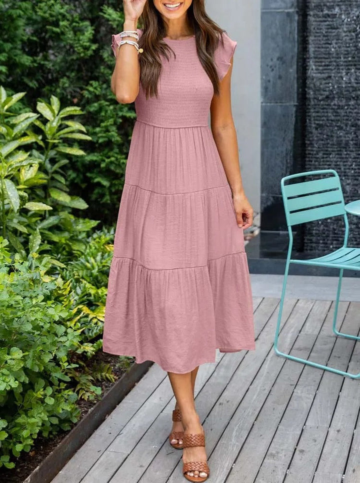 Schönes Damenkleid in Orange, ideal für Sommer und Frühling, mit angenehmem Tragegefühl.