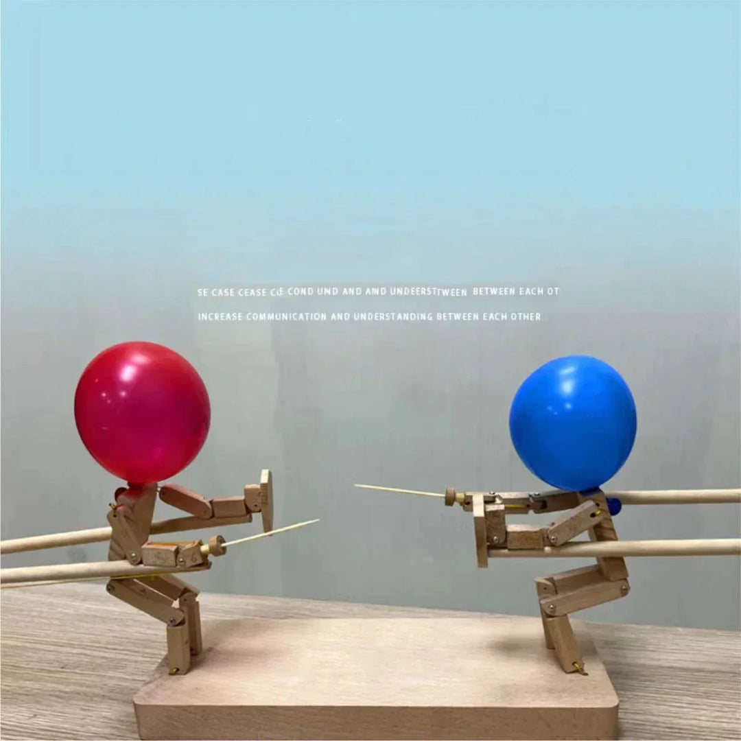 "DuelPop Ballon-Schwertspiel: Vier farbige Schwerter und Luftballons für spannende Duelle und actiongeladenen Spielspaß."