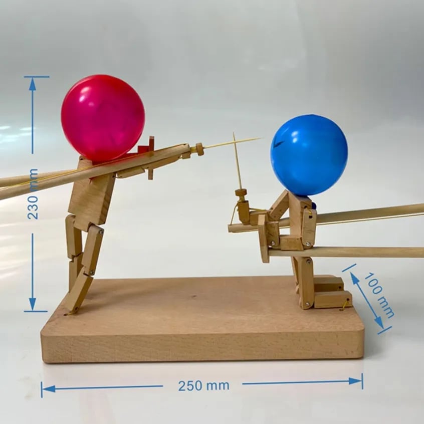 "DuelPop Ballon-Schwertspiel: Vier farbige Schwerter und Luftballons für spannende Duelle und actiongeladenen Spielspaß."