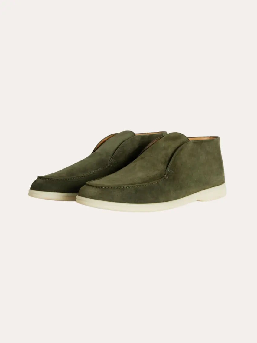Dunkelgrüne Herren-Loafer aus Leder, elegant und bequem, ideal für Büro und Freizeit. Klassischer Schlupfschuh.