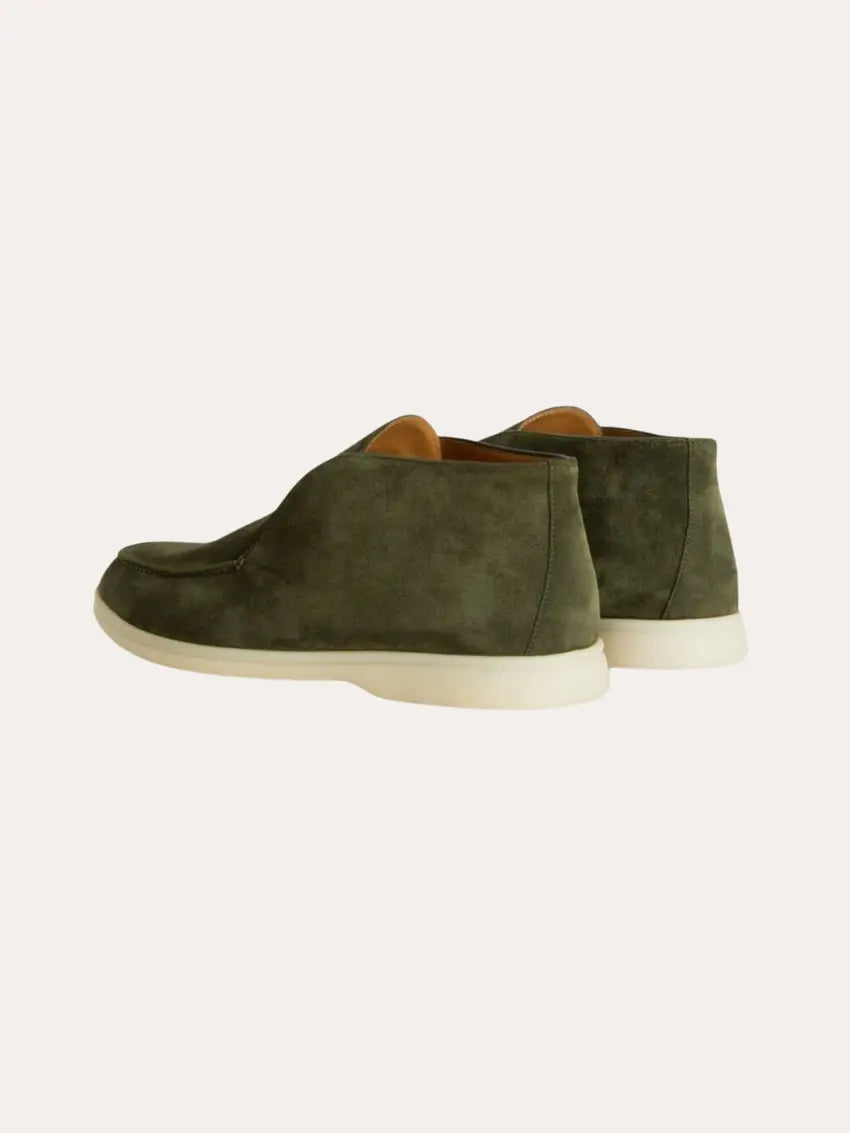 Stylische dunkelgrüne Herren-Loafer, perfekt als elegante Business- oder Freizeitschuhe für Frühling und Herbst.