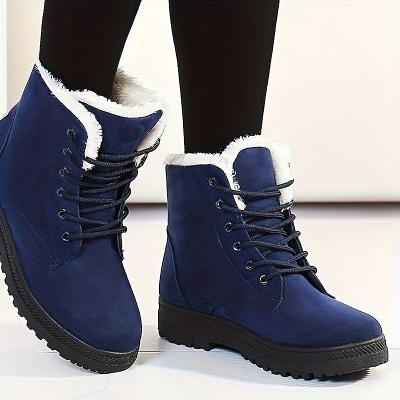 Schwarze Damen Schnürstiefeletten mit Warmfutter, ideal für Winter. Rutschfeste Sohle für sicheren Halt.
